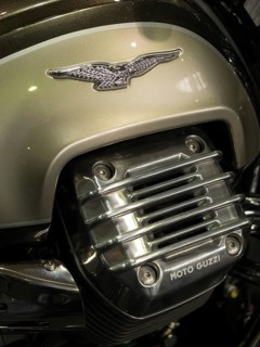 Close-up of a Moto Guzzi engine with a logo and chrome accents, dortmund, germany