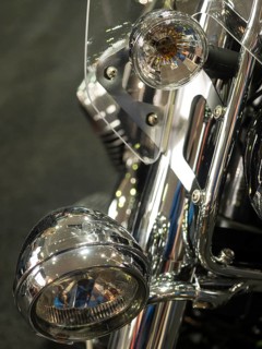 Detail of a motorbike with shiny chrome and headlight parts, dortmund, germany