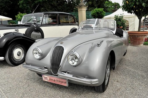 Grey Jaguar convertible with curved lines and elegant classic car style, Retro Classics meets