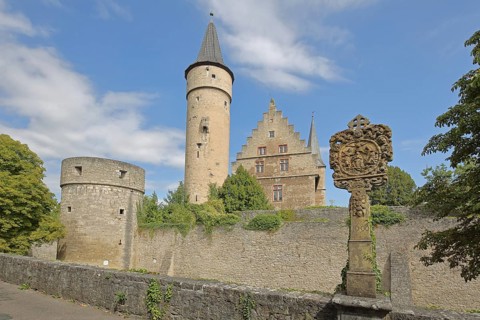 Thick tower, cathedral chapter palatium, St Nicholas' tower and historic wayside shrine from 1697