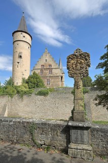 Cathedral chapter palatium, St Nicholas' Tower, historic wayside shrine from 1697 with crowning of