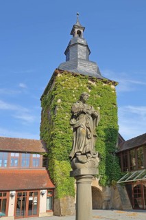Late Gothic gate tower and Madonna figure, market square, Saal an der Saale, Lower Franconia,