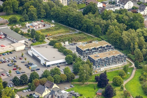 Aerial view, construction site with new residential quarter An der Schlacht, behind Lidl