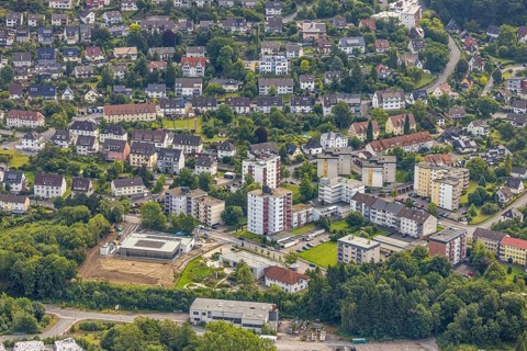 Aerial view, high-rise housing estate Lasmecke, below construction site with new swimming pool with