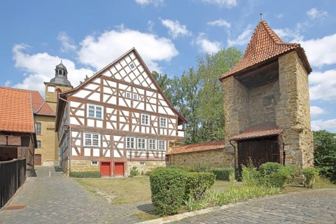 Historic old school built in 1672 and powder tower built in the 16th century, former town