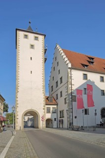 Upper tower and town hall with stepped gable, town gate, town tower, flags, Haßfurt, Lower