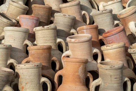 Full frame shot showing lots of sunny illuminated amphoras