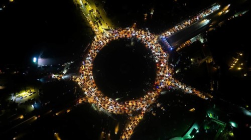 Aerial view shows crowds of Syrians celebrating in Umayyad Square in central Damascus after the
