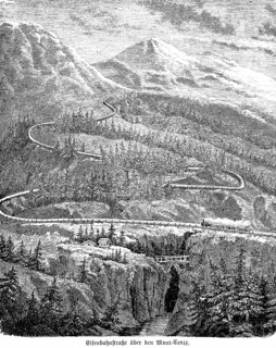 Railway road across the Tyrolean Alps, Austria, mountain landscape, gorge, tracks in serpentine
