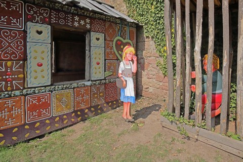 Gingerbread house for the fairy tale Hansel and Gretel, fairy tale figures, hut, wooden posts,