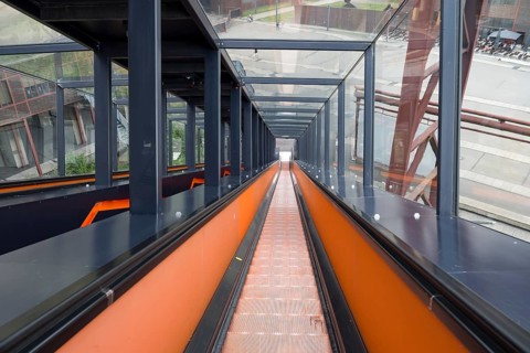 Orange escalator descending, visitor centre, Ruhr Museum, Zeche Zollverein, UNESCO World Heritage