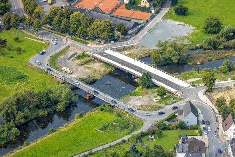 Aerial view, temporary bridge and construction site with new construction of the Dinscheder