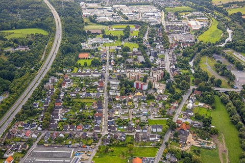Aerial view, residential area Breddestraße in Hüsten with motorway A46, river Ruhr, above stadium