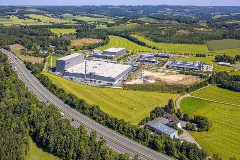 Aerial view, industrial area, industrial park Grünewald with construction site, motorway A45, hilly
