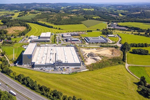 Aerial view, industrial area, industrial park Grünewald with construction site, motorway A45, hilly