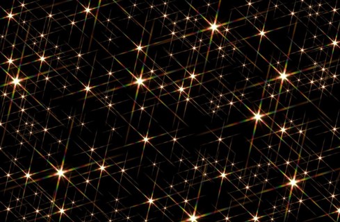 Black background blotched with shiny stars