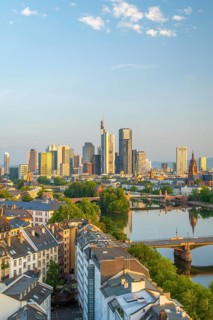 Frankfurt Skyline, Residential Buildings, Bridges and Main River at Sunrise. Wide Shot. Aerial View