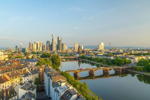 Frankfurt City Skyline, Residential Buildings, Bridges and Main River on Sunny Morning. Wide Shot.