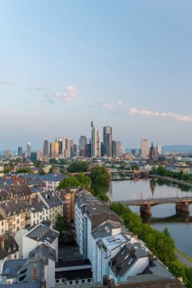 Frankfurt City Downtown, Residential Buildings, Bridges and Main River at Sunrise. Wide Shot.
