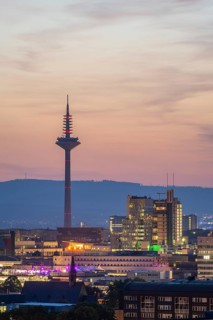 FRANKFURT, GERMANY, JUNE 12, 2025: Illuminated Europaturm Telecommunications Tower in Frankfurt