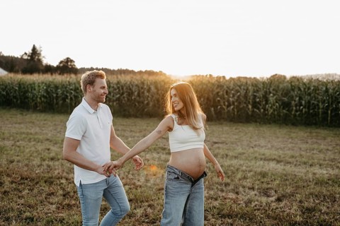 Pregnant, young woman with partner