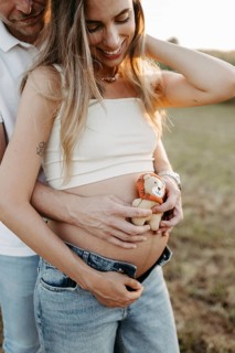 Pregnant, young woman with partner