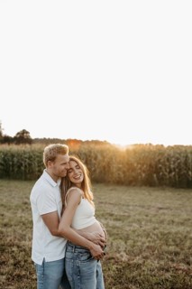 Pregnant, young woman with partner