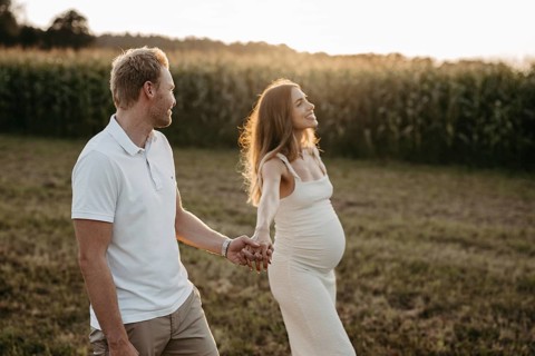 Pregnant, young woman with partner