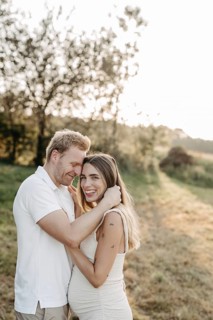 Pregnant, young woman with partner