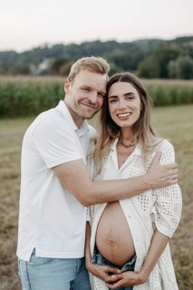Pregnant, young woman with partner