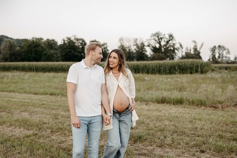 Pregnant, young woman with partner