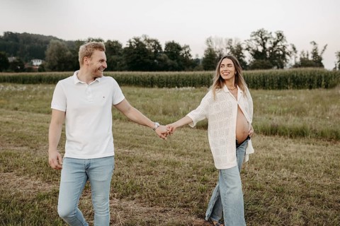 Pregnant, young woman with partner