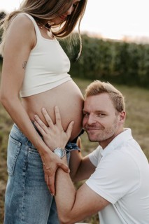 Pregnant, young woman with partner