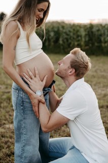 Pregnant, young woman with partner