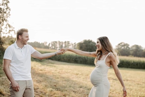 Pregnant, young woman with partner