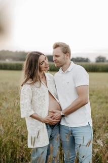 Pregnant, young woman with partner