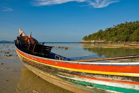 Longtail boat impressions in Siam Bay on Racha Yai Island off the southern tip of the Thai holiday