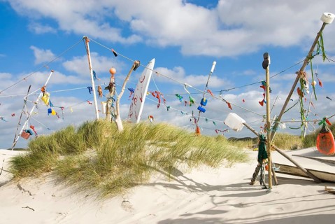 Works of art made from rubbish washed up from the sea in the dune landscape of the North Frisian