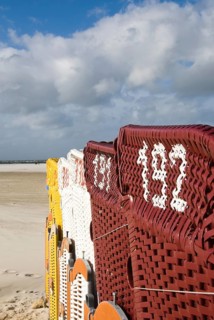 The beach chairs in the village of Norddorf on the North Frisian island of Amrum go into