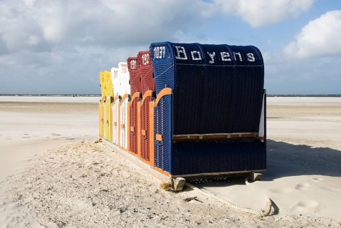 The beach chairs in the village of Norddorf on the North Frisian island of Amrum go into