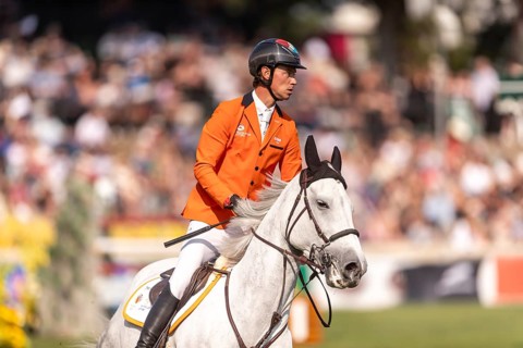 Kevin Jochems of the Netherlands, riding Camilla Van de Helle, competes in the first round of the
