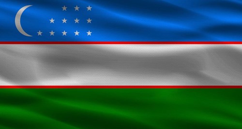 Uzbekistan flag with fabric texture. Realistic flag of Uzbekistan waving