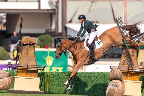 Gabriel De Matos Machado of Brazil, riding Nyles Van de Mottelhoeve, competes in the first round of