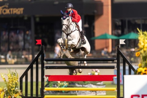 Lillie Keenan of the USA, riding Argan De Beliard, competes in the first round of the 2025 BMO
