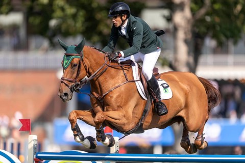Gabriel De Matos Machado of Brazil, riding Nyles Van de Mottelhoeve, competes in the first round of