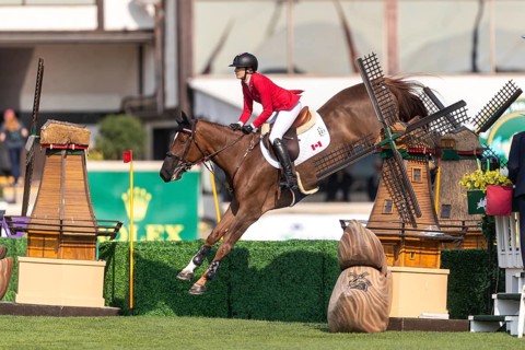 Tiffany Foster of Canada, riding Electrique, competes in the first round of the 2025 BMO Nations