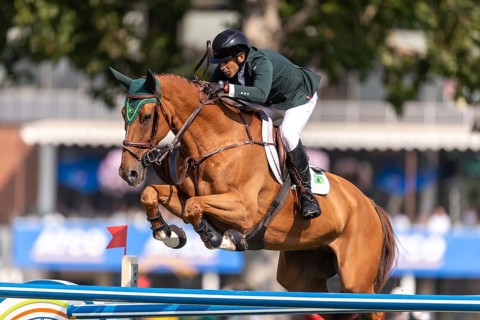 Gabriel De Matos Machado of Brazil, riding Nyles Van de Mottelhoeve, competes in the first round of