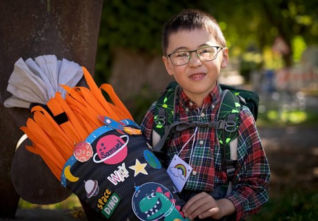 Boy, 6 years, glasses, multi-ethnic, on the day of enrolment in first grade of primary school,