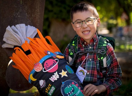 Boy, 6 years, glasses, multi-ethnic, on the day of enrolment in first grade of primary school,