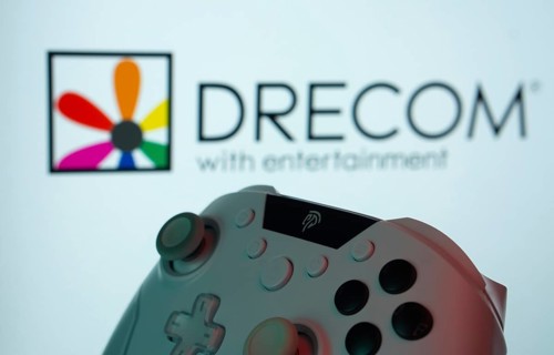 Dhaka, Bangladesh- 12 June 2025: A close-up of a gamepad with the Drecom seen on screen in the